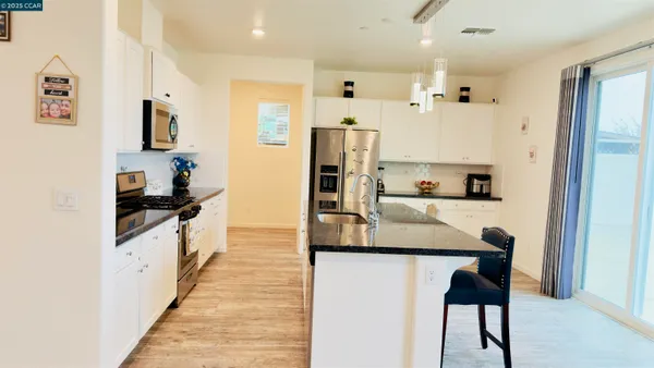 a kitchen with counter top space and a sink