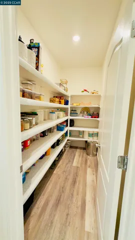 a bedroom with a bed and dresser