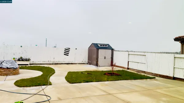 a bedroom with a bed and a mirror