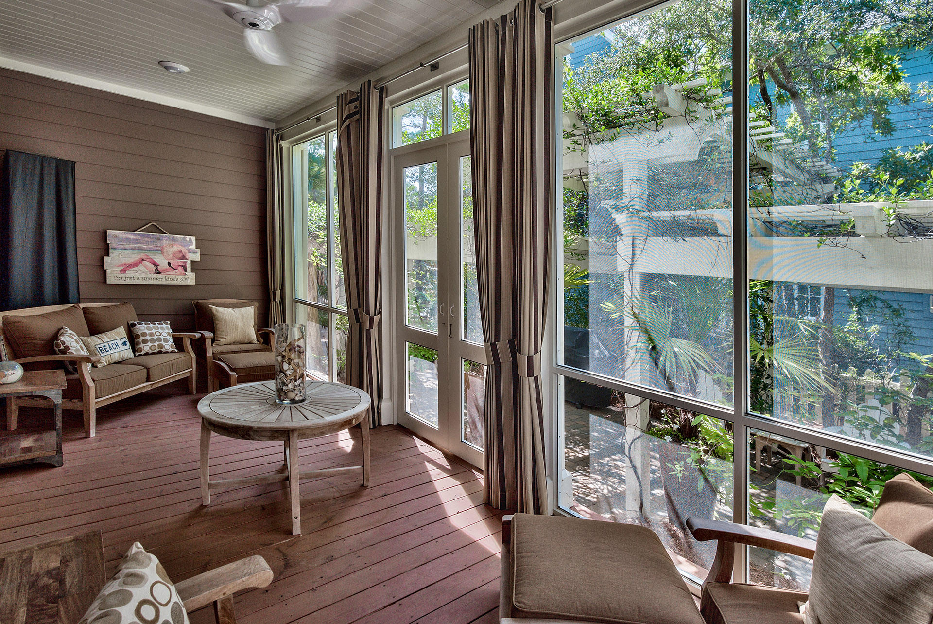 191 Plimsoll Way Santa Rosa Beach, FL 32459 - Photo 16 of 49 a living room with furniture and a floor to ceiling window