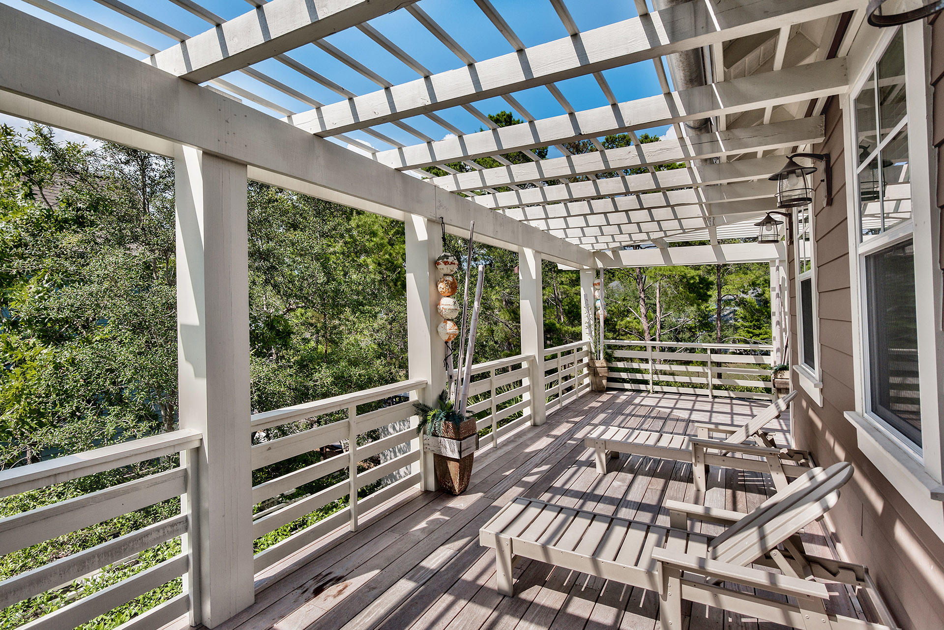 191 Plimsoll Way Santa Rosa Beach, FL 32459 - Photo 28 of 49 a view of an empty room with wooden floor and iron walls