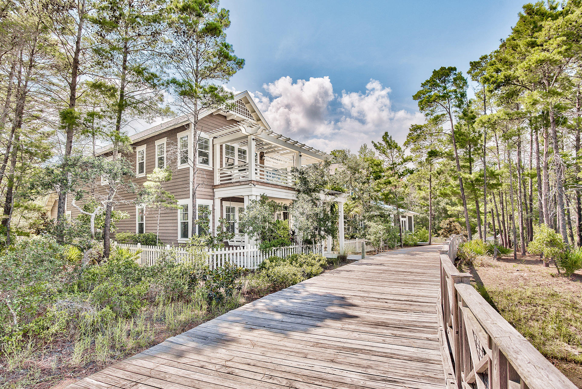 191 Plimsoll Way Santa Rosa Beach, FL 32459 - Photo 4 of 49 a front view of a house with a yard
