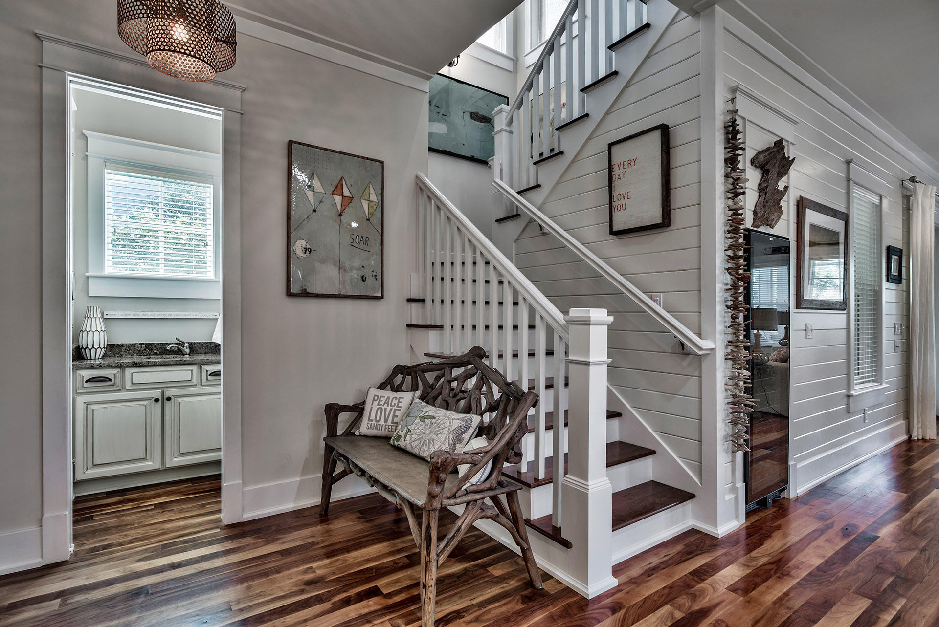 191 Plimsoll Way Santa Rosa Beach, FL 32459 - Photo 6 of 49 a livingroom with wooden floor and white walls