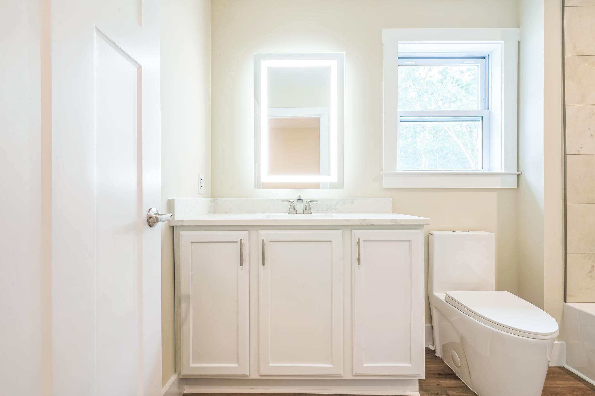70 West Rising Sun Drive Ocean View, NJ 08230 - Photo 26 of 34 a bathroom with a sink a toilet and a window