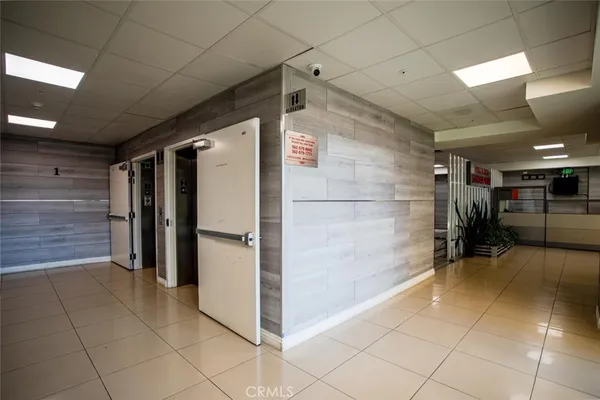 a view of a refrigerator in a room