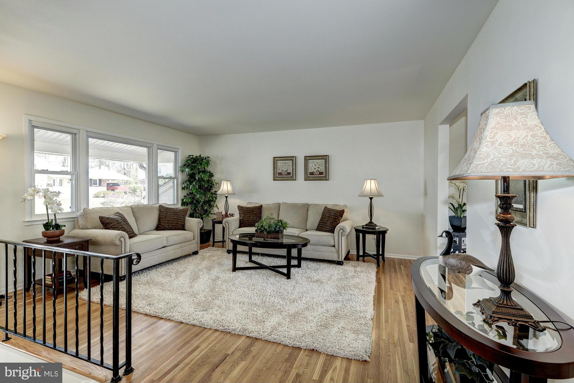 8307 Brixton Street Springfield, VA 22152 - Photo 2 of 30 Living room with newly refinished hardwoods