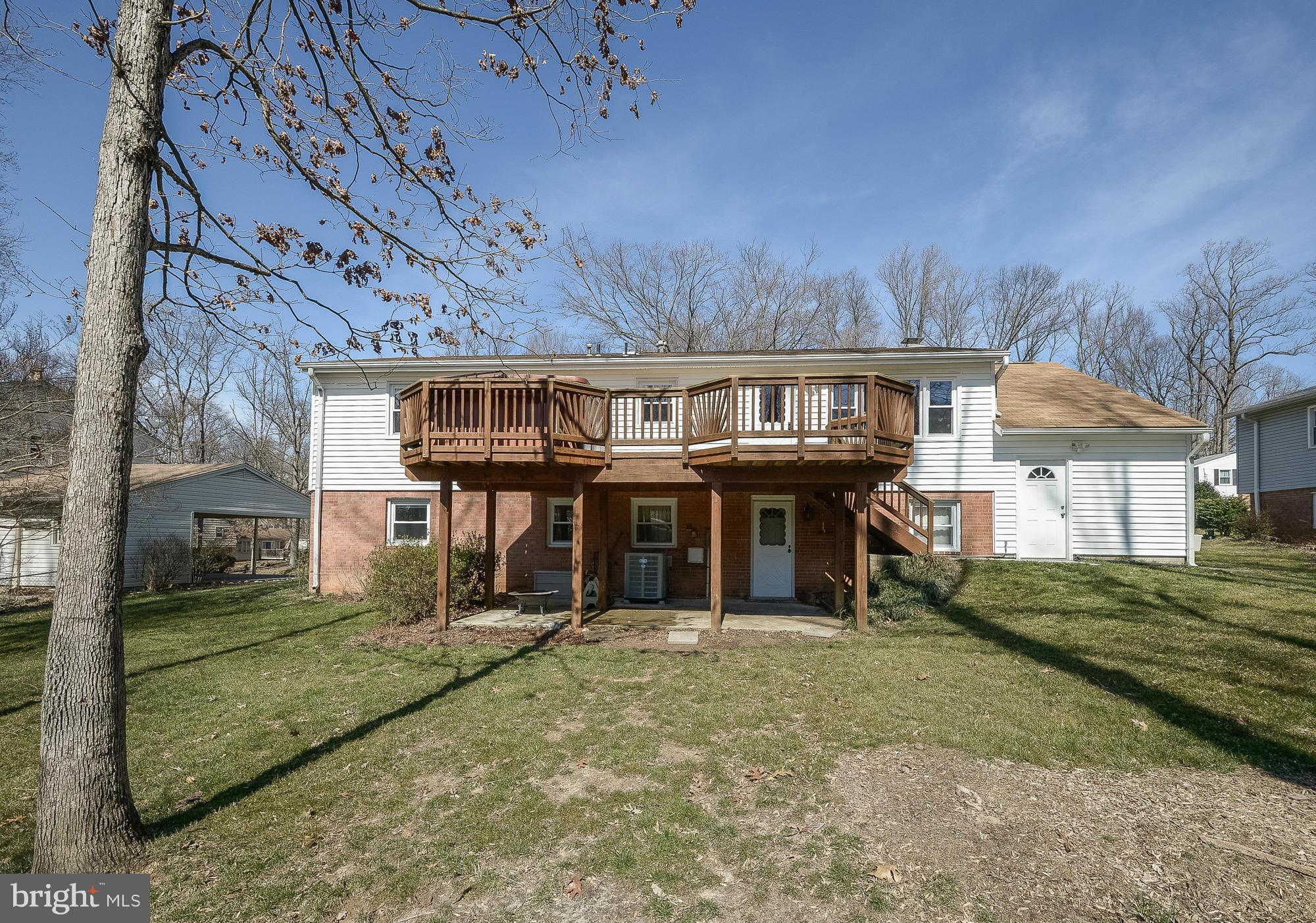 8307 Brixton Street Springfield, VA 22152 - Photo 25 of 30 Large deck on rear of house