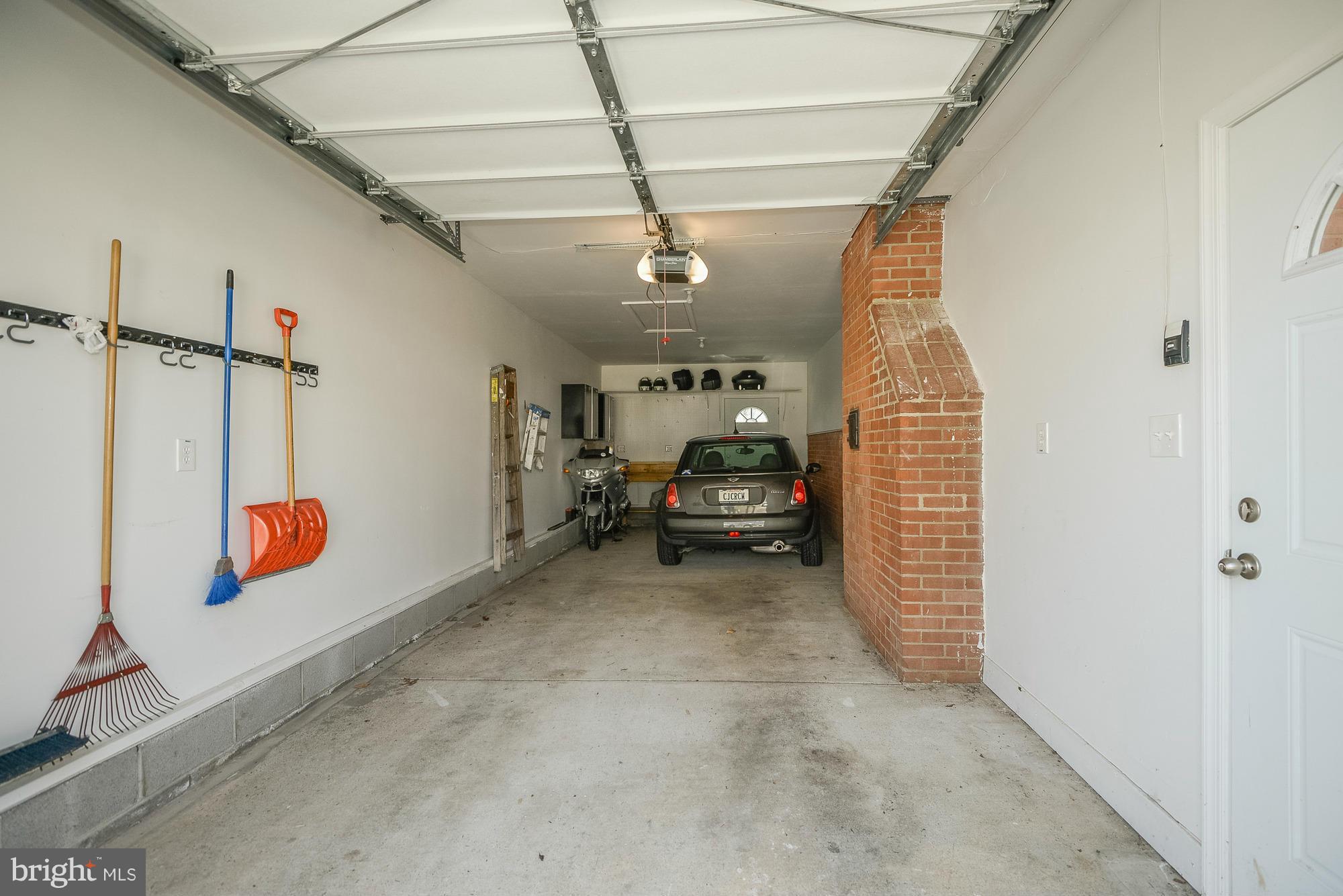 8307 Brixton Street Springfield, VA 22152 - Photo 27 of 30 Oversize tandem garage with attic storage