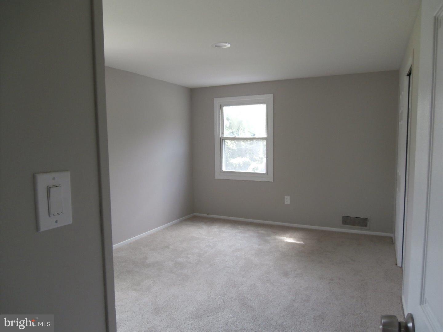 12 Hasting Lane Willingboro, NJ 08046 - Photo 12 of 13 a view of an empty room with a window