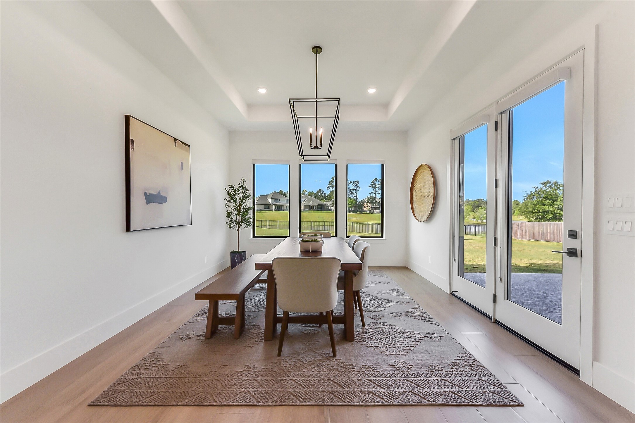 4903 Lagos Lagoon Way Spring, TX 77389 - Photo 16 of 49 Expanded breakfast area showcasing serene views for the large backyard and lake that you must experience in person.