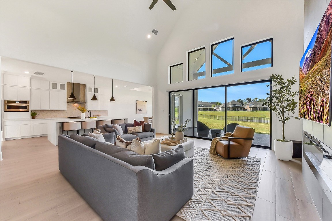 4903 Lagos Lagoon Way Spring, TX 77389 - Photo 19 of 49 Natural light with walls of windows and the lake views!