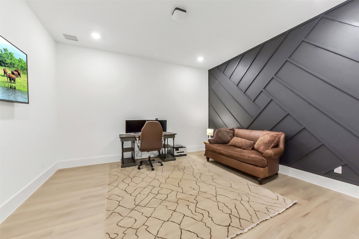 4903 Lagos Lagoon Way Spring, TX 77389 - Photo 20 of 49 Flex room downstairs with custom accent wall that is currently being used as a secondary office. Could be used as a media room.