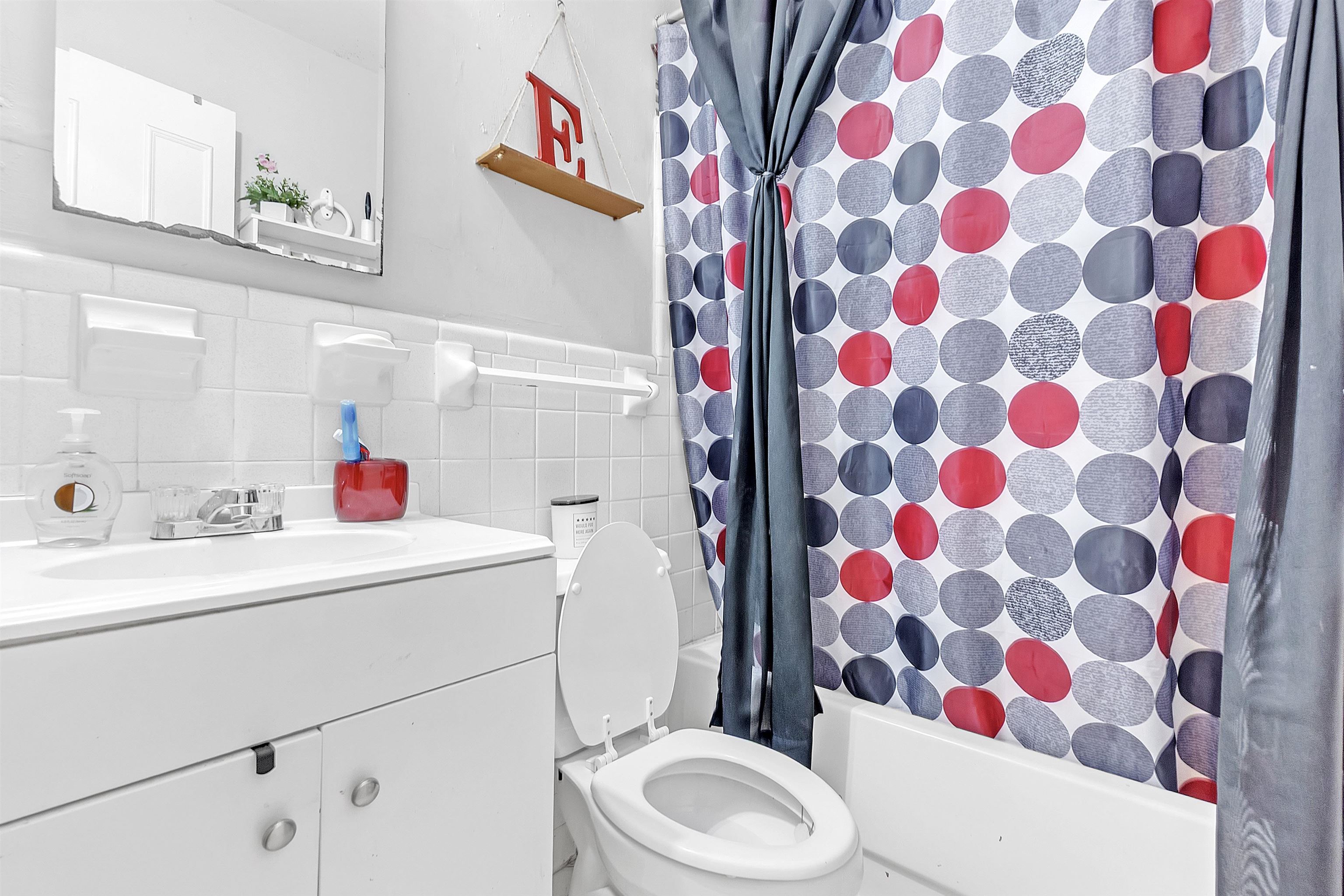 4159 Cochese Road Memphis, TN 38118 - Photo 11 of 18 a bathroom with a sink toilet and shower