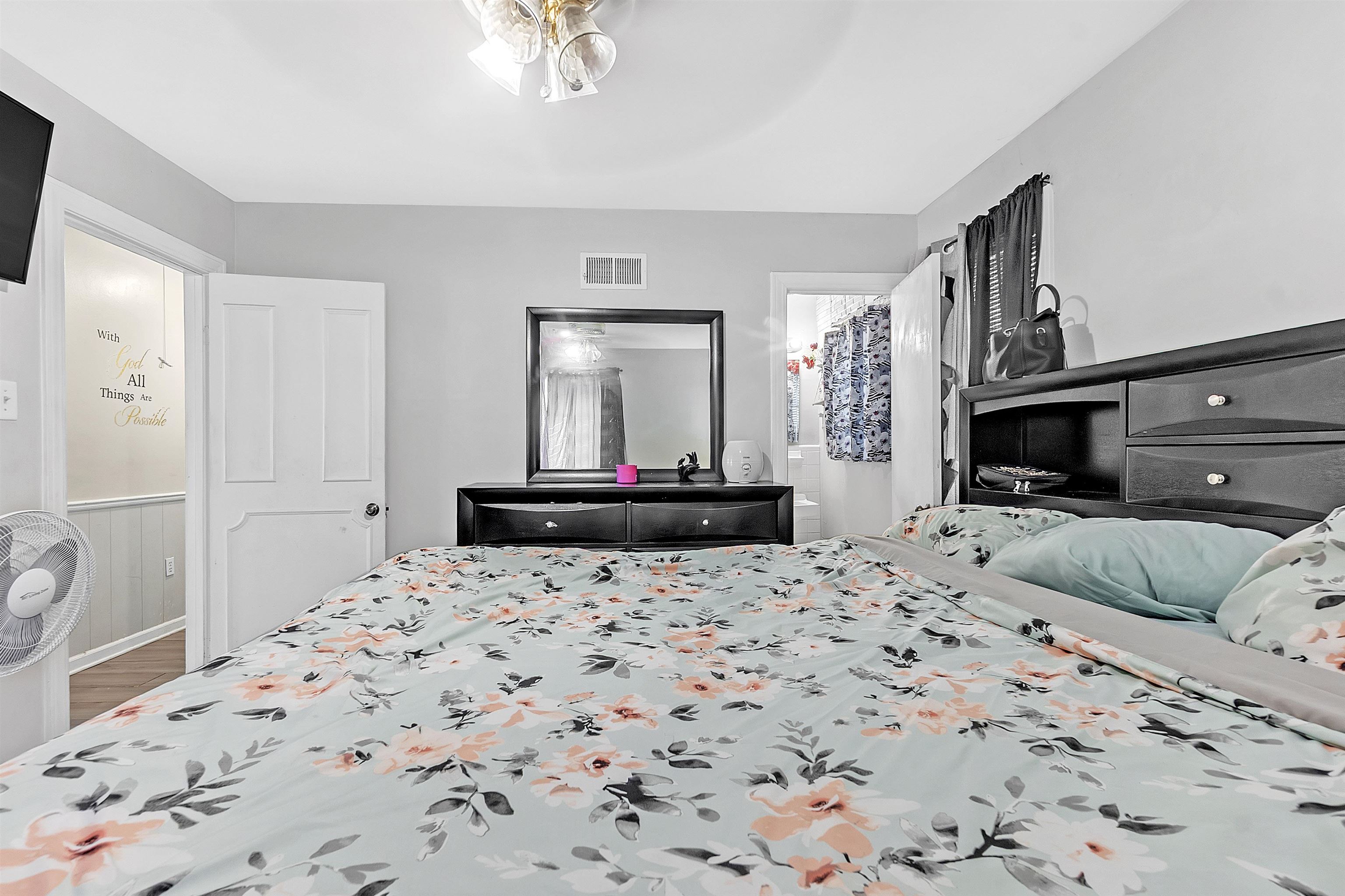 4159 Cochese Road Memphis, TN 38118 - Photo 13 of 18 a living room with a bed and a television