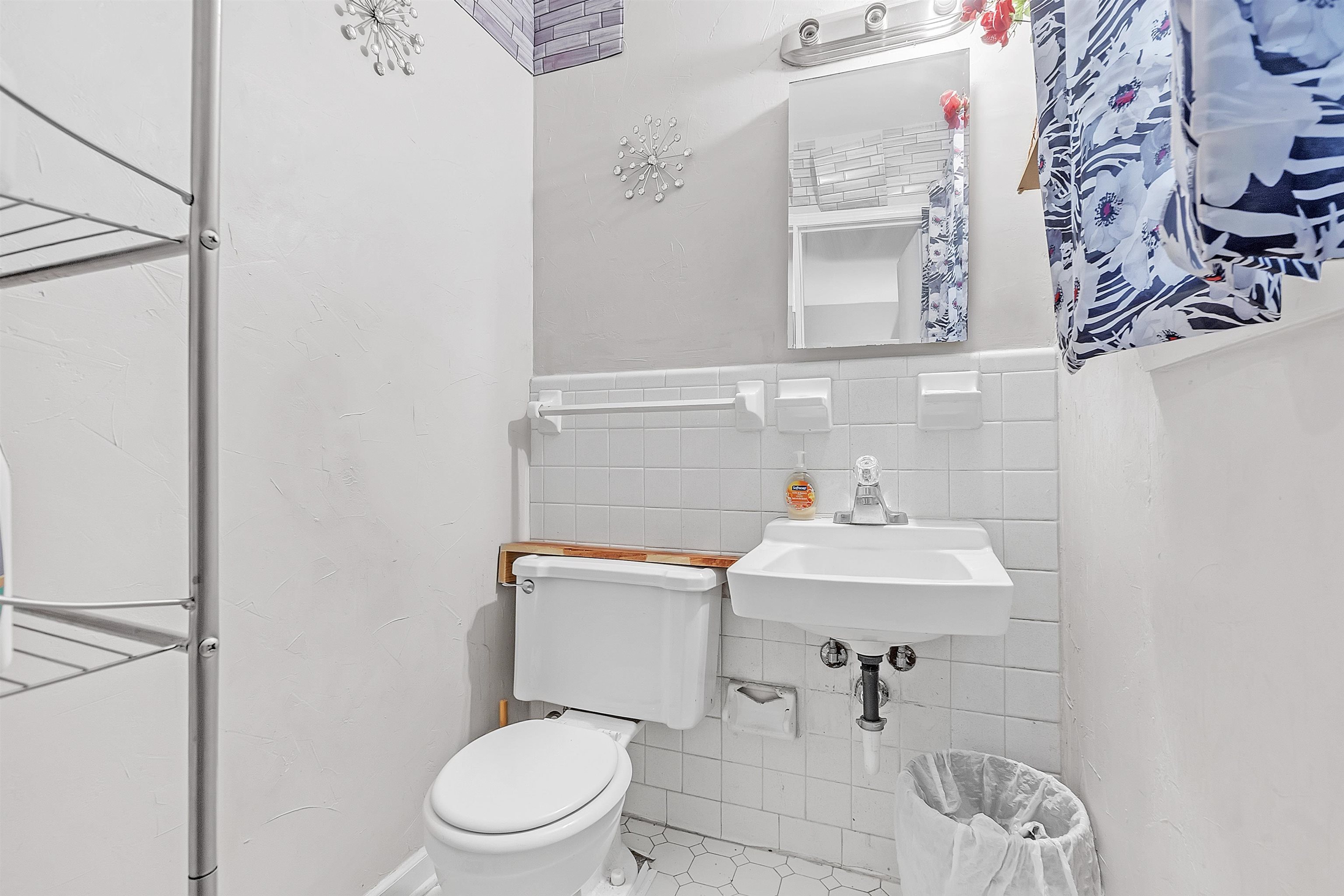 4159 Cochese Road Memphis, TN 38118 - Photo 14 of 18 a bathroom with a sink a toilet and mirror