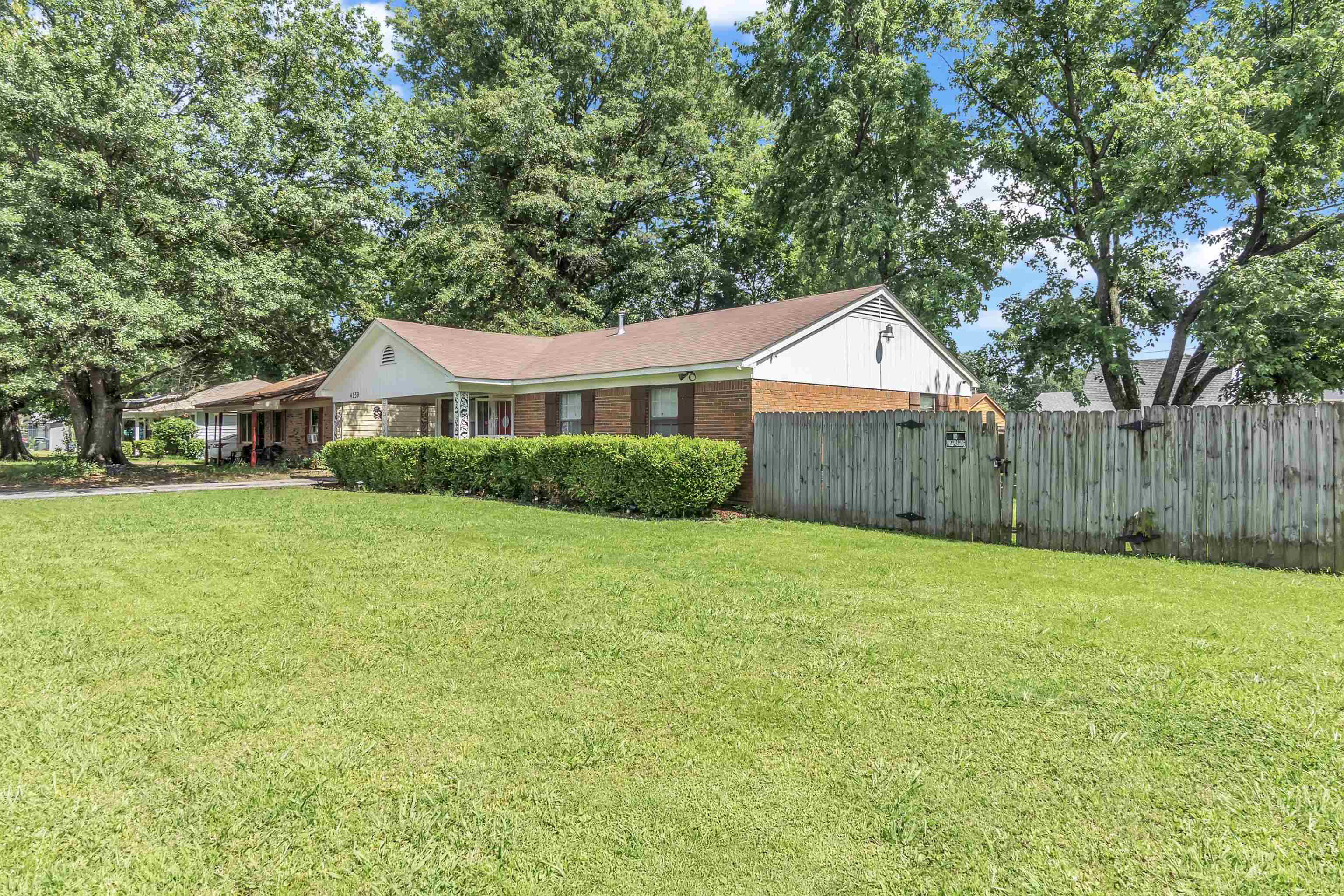 4159 Cochese Road Memphis, TN 38118 - Photo 3 of 18 a front view of a house with garden