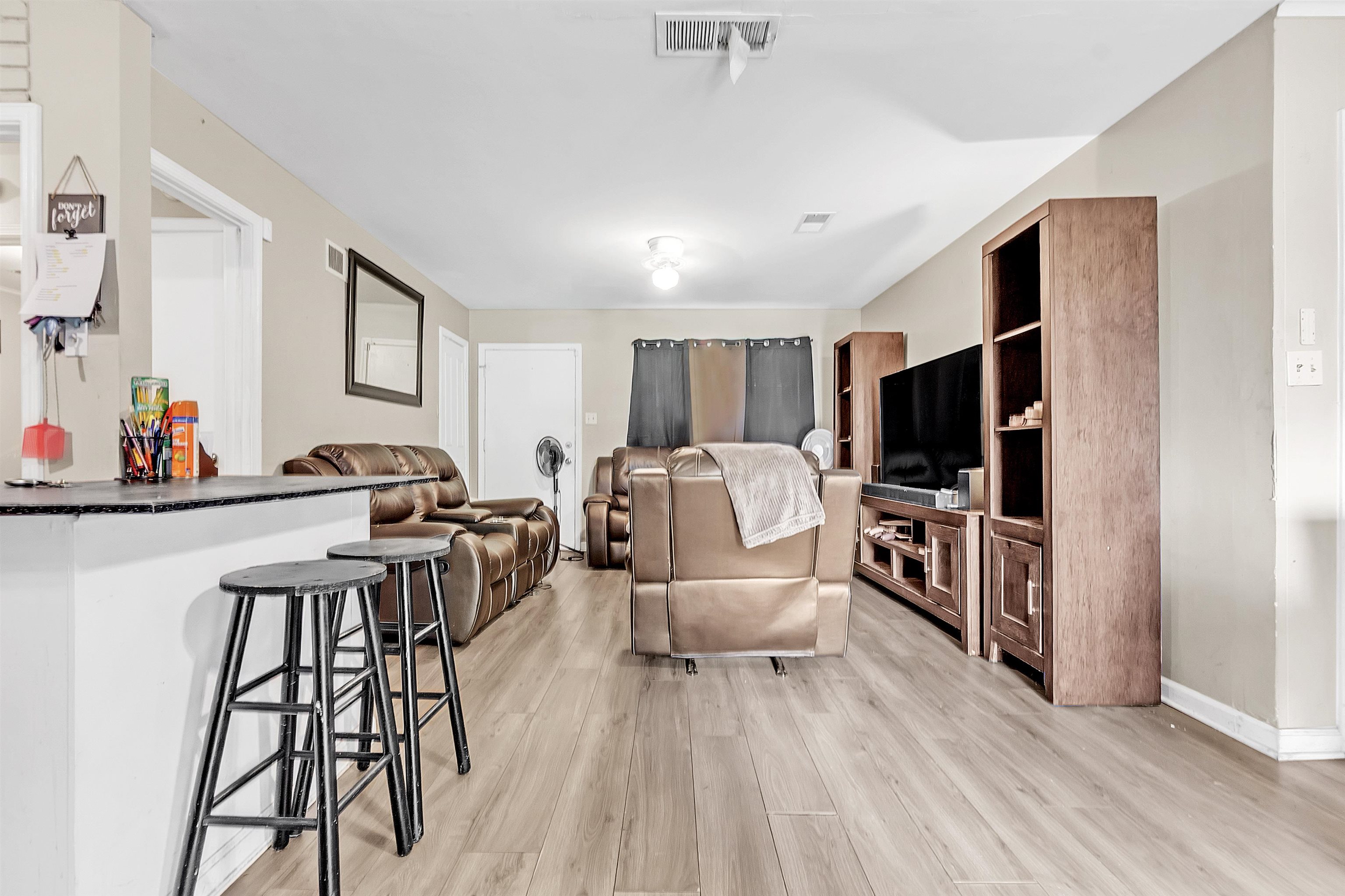 4159 Cochese Road Memphis, TN 38118 - Photo 6 of 18 a living room with furniture and a flat screen tv