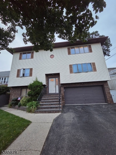 front view of house with a yard
