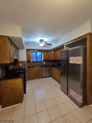 a large kitchen with a cabinets and counter space