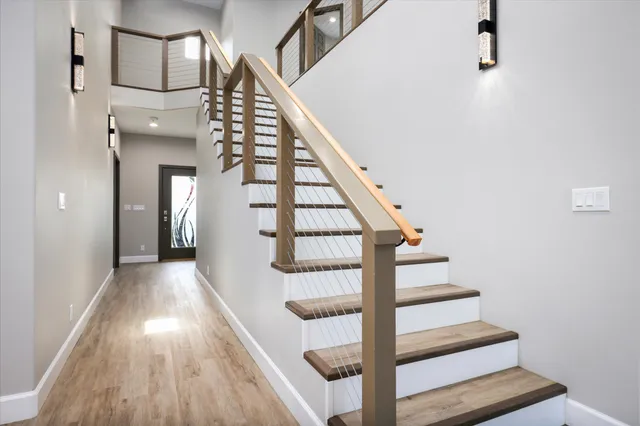 a view of entryway with wooden floor