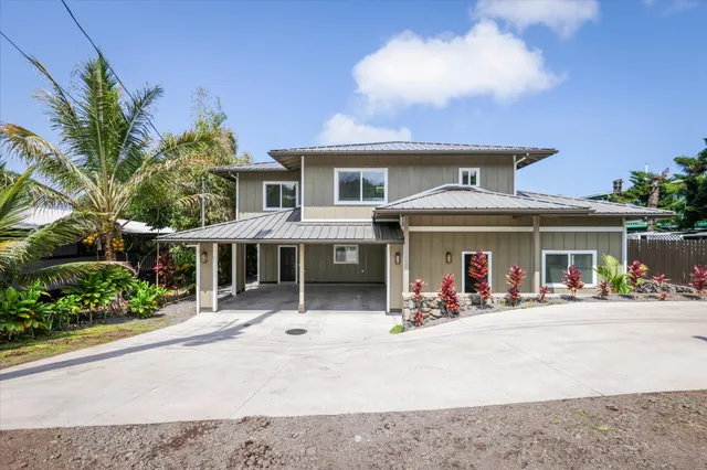 front view of a house with a patio