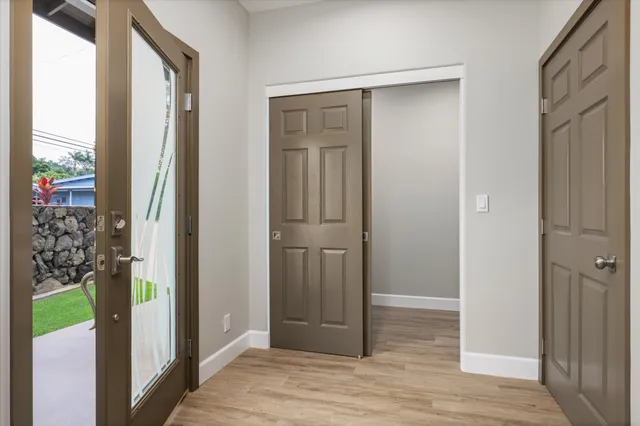 a view of a bathroom from a hallway