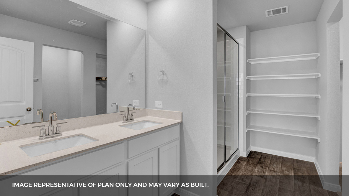 268 Mountain Pea Road Kyle, TX 78640 - Photo 15 of 18 a bathroom with a sink and a mirror