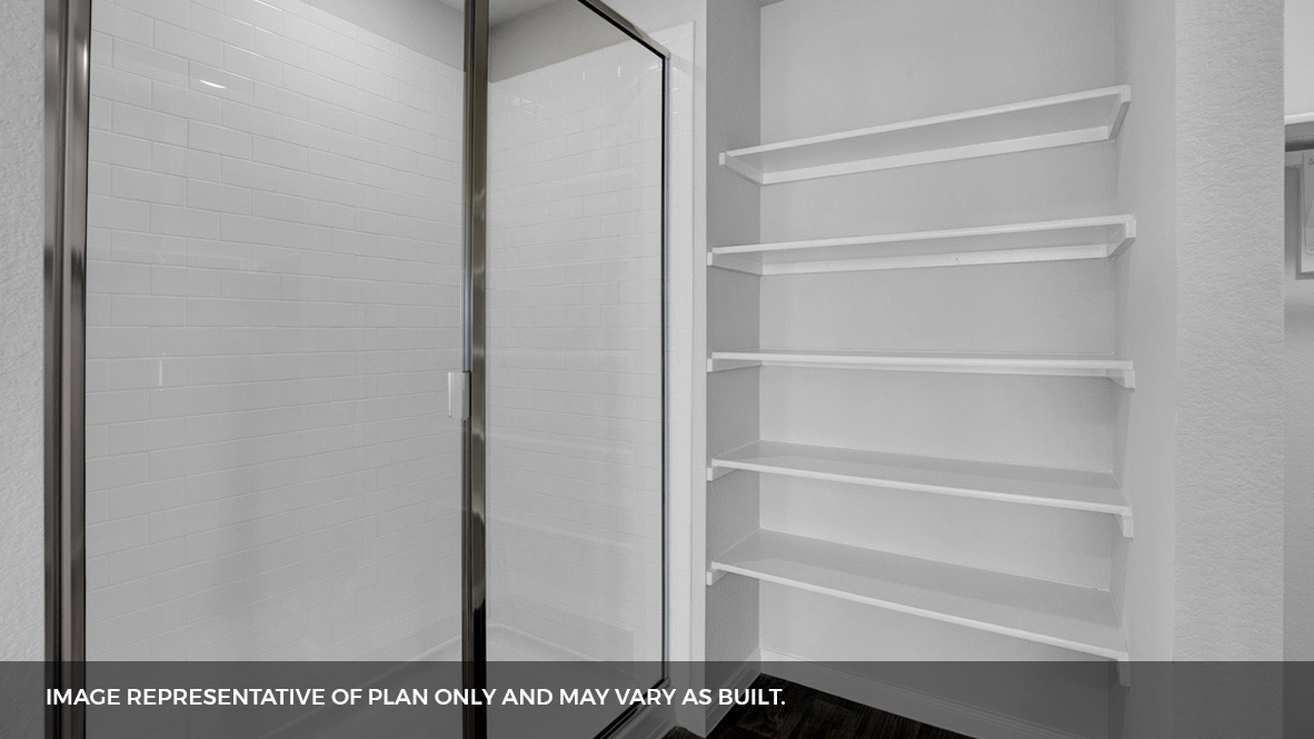 268 Mountain Pea Road Kyle, TX 78640 - Photo 16 of 18 a view of walk in closet with empty racks