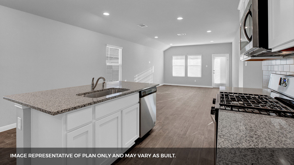 268 Mountain Pea Road Kyle, TX 78640 - Photo 8 of 18 a kitchen with a sink and cabinets