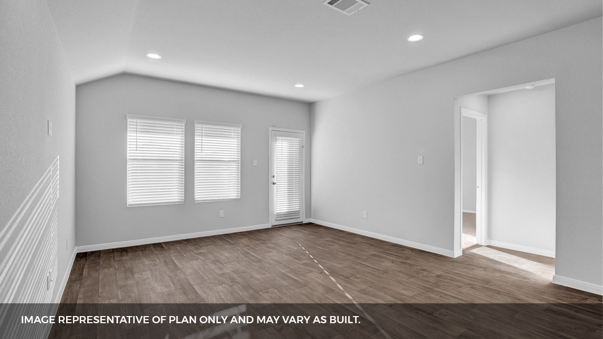 268 Mountain Pea Road Kyle, TX 78640 - Photo 10 of 18 an empty room with wooden floor and windows