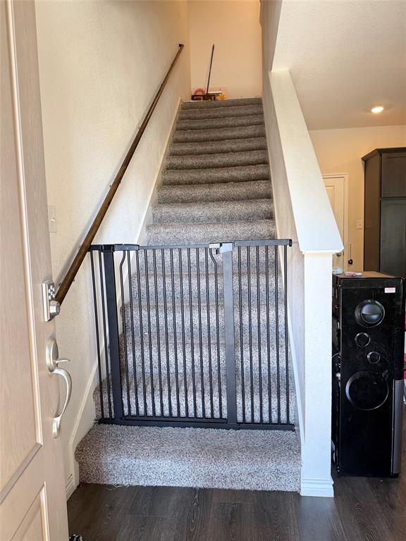 2001 Juniper Pass Way Mesquite, TX 75149 - Photo 6 of 12 Stairs with wood finished floors