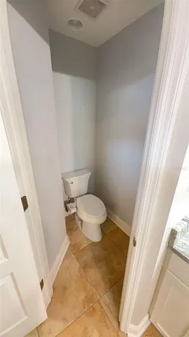 a bathroom with a toilet and a sink