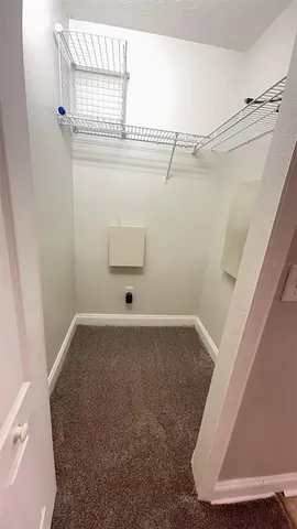 a view of a room with rack on the wall