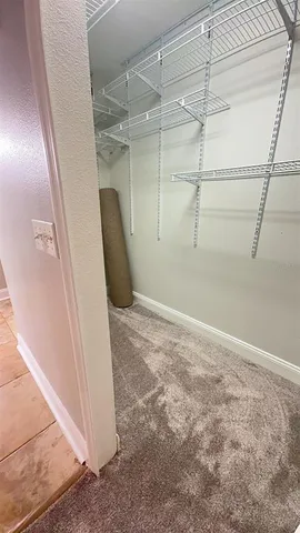 a view of a room with an empty space