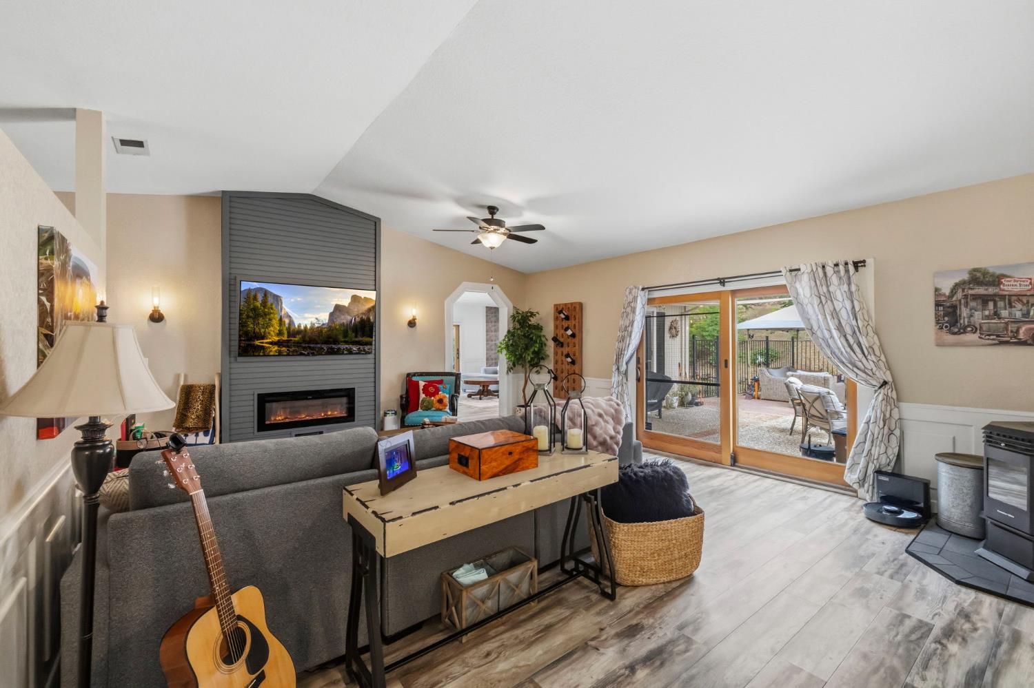 11460 Racetrack Road Sonora, CA 95370 - Photo 15 of 46 a living room with furniture fireplace and flat screen tv