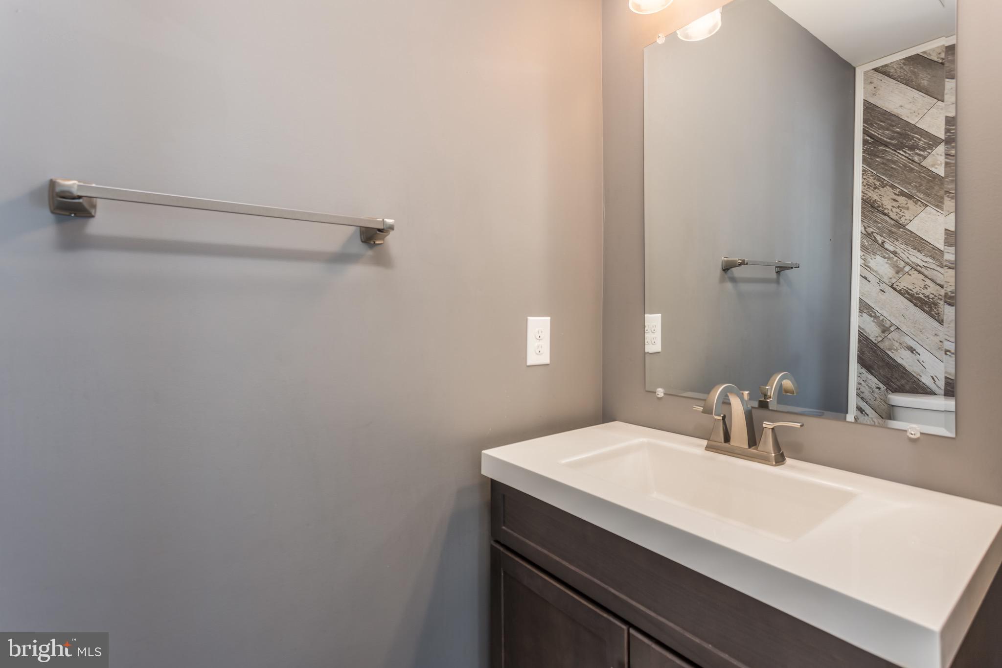 338 Rumbling Rock Road Hedgesville, WV 25427 - Photo 15 of 28 Main level half bath