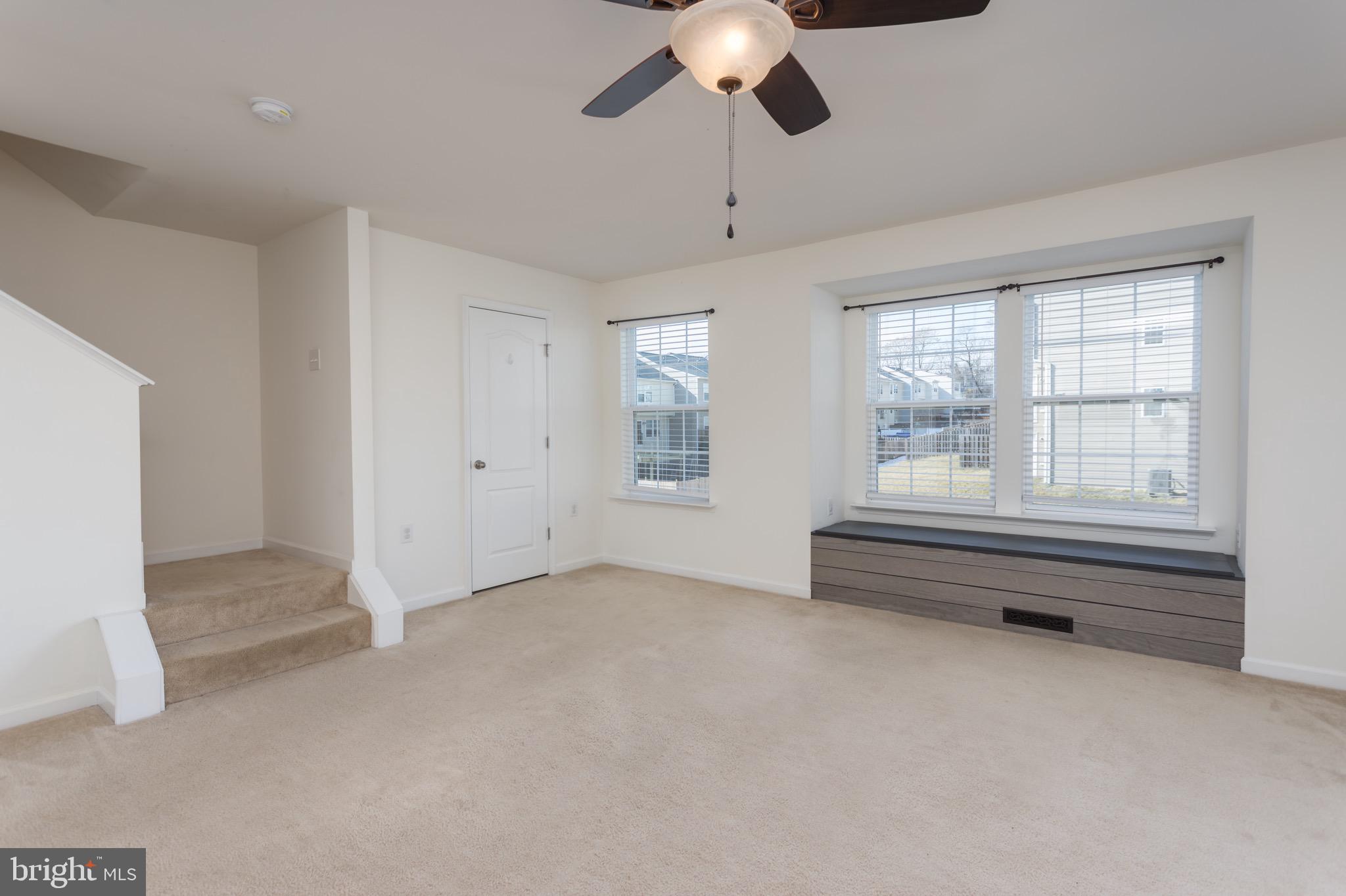 338 Rumbling Rock Road Hedgesville, WV 25427 - Photo 6 of 28 Living room with windiow seat