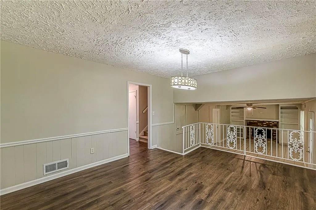 3661 Boring Road Decatur, GA 30034 - Photo 14 of 41 a view of a room with wooden floor kitchen view and a window