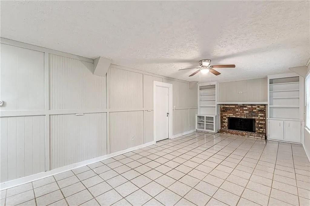 3661 Boring Road Decatur, GA 30034 - Photo 16 of 41 a view of an empty room with a fireplace