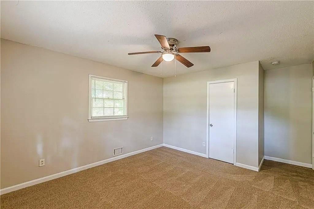 3661 Boring Road Decatur, GA 30034 - Photo 34 of 41 a view of room with a ceiling fan and a window