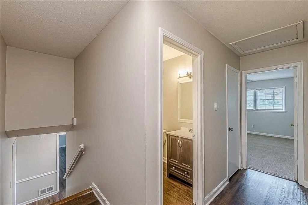 3661 Boring Road Decatur, GA 30034 - Photo 35 of 41 a view of a hallway with wooden floor
