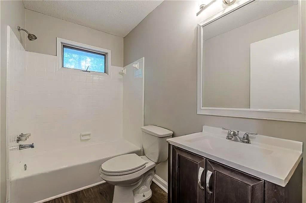 3661 Boring Road Decatur, GA 30034 - Photo 36 of 41 a bathroom with a sink toilet and a mirror