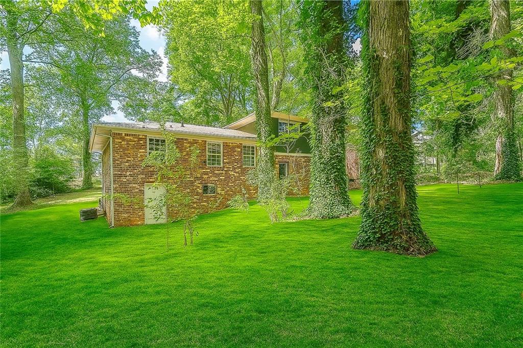 3661 Boring Road Decatur, GA 30034 - Photo 40 of 41 a view of a backyard with large trees