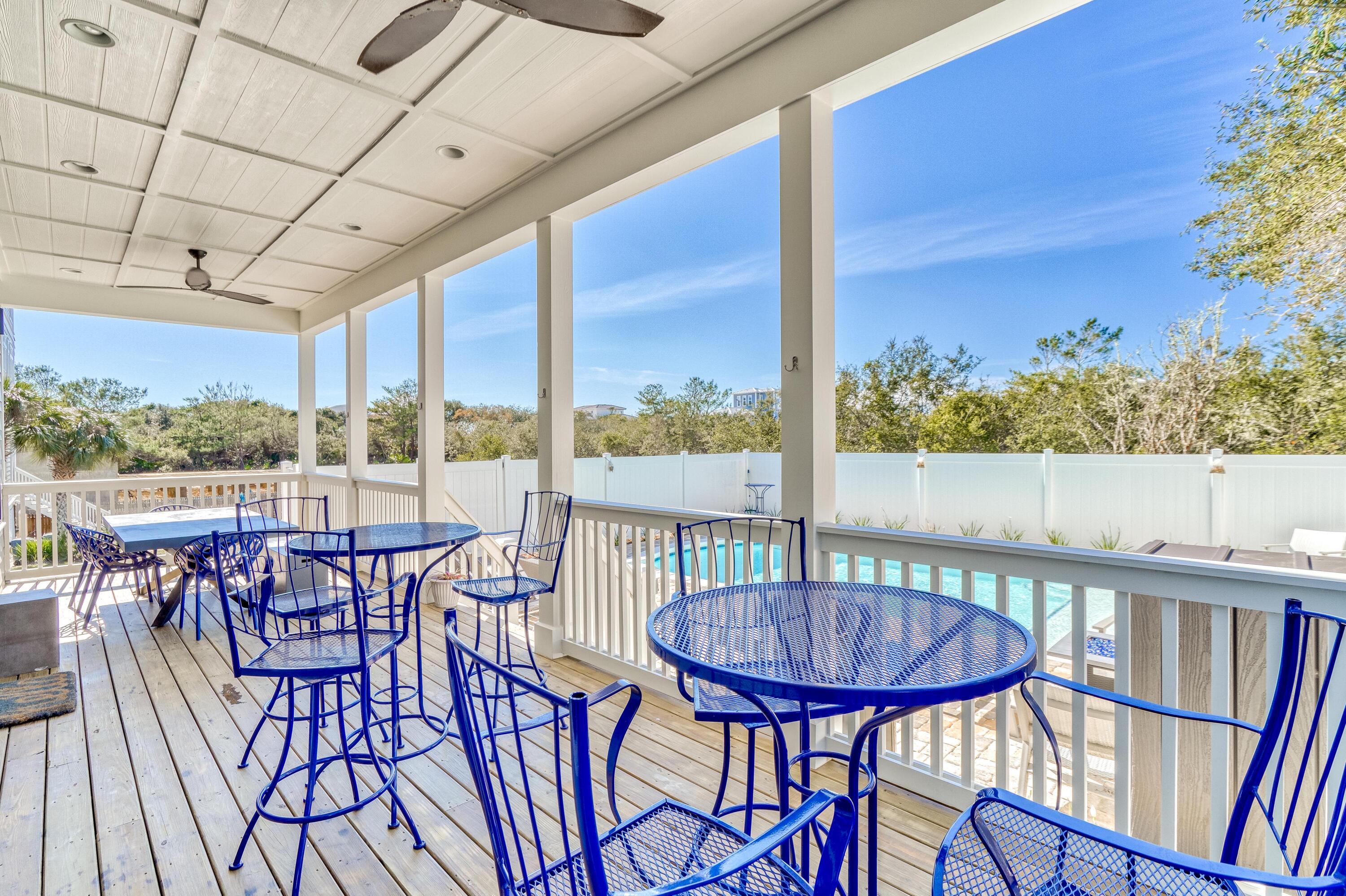 101 A St Inlet Beach Inlet Beach, FL 32461 - Photo 12 of 47 a view of a balcony with furniture and a yard