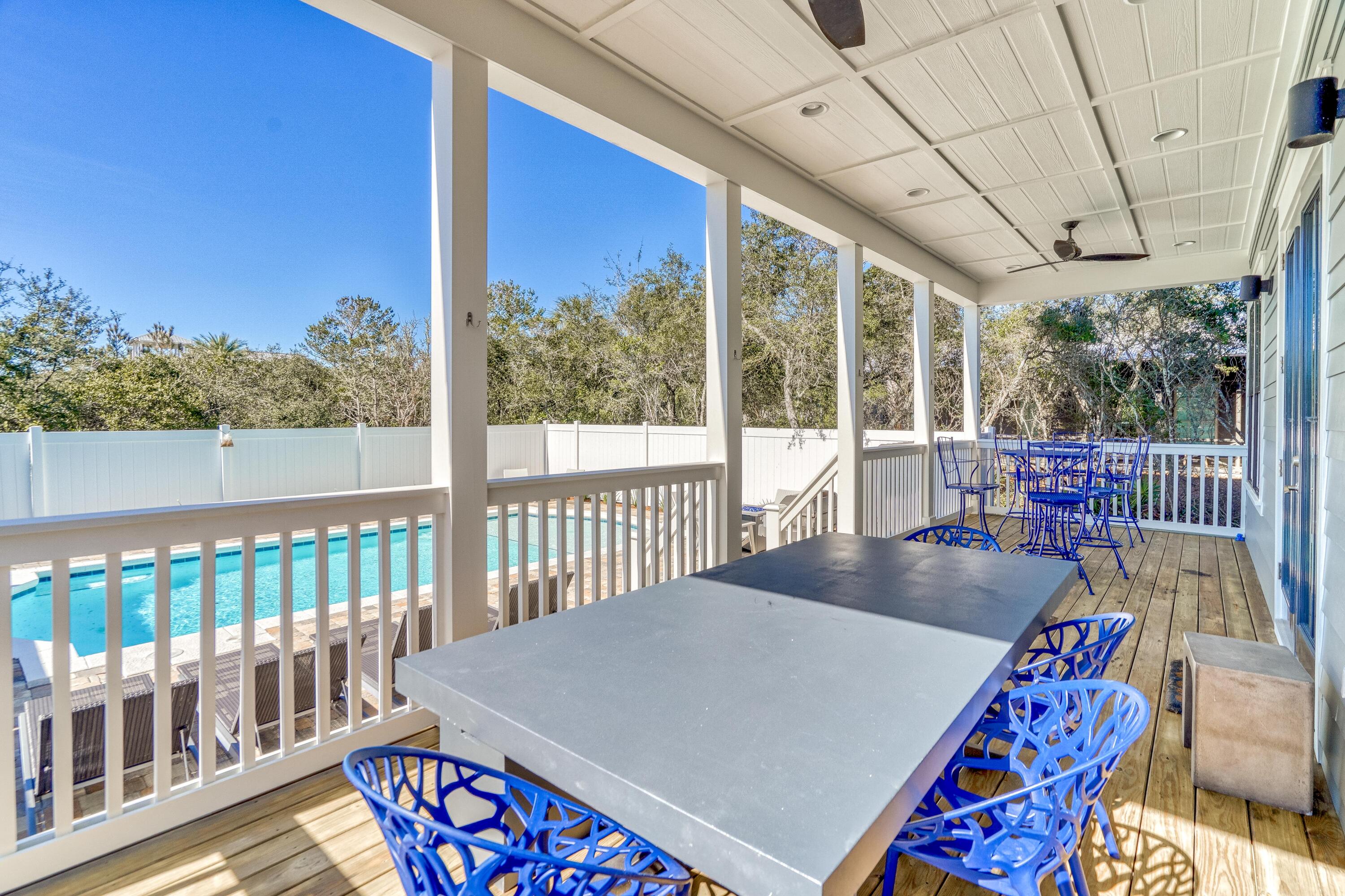 101 A St Inlet Beach Inlet Beach, FL 32461 - Photo 13 of 47 a balcony with furniture and wooden floor