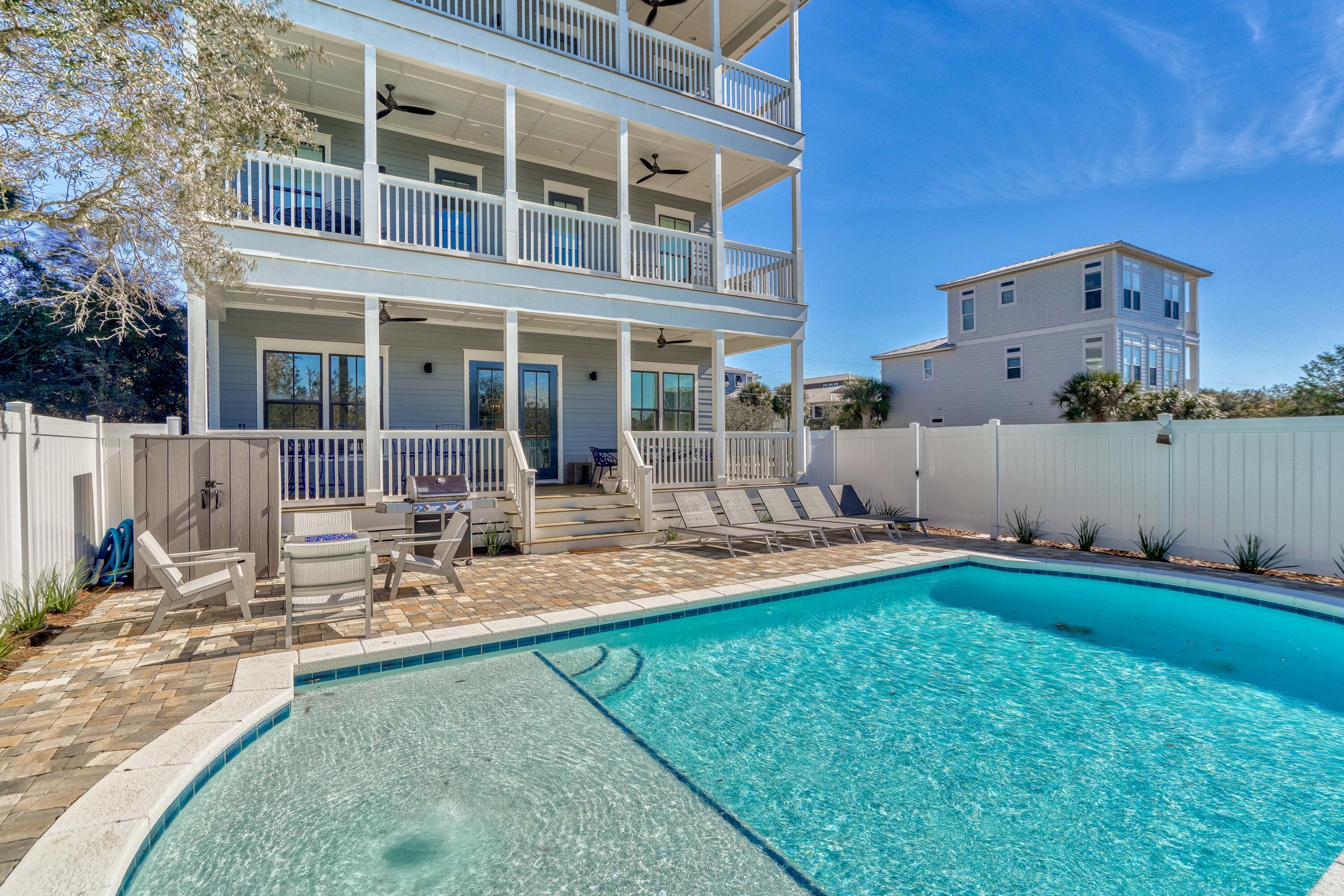 101 A St Inlet Beach Inlet Beach, FL 32461 - Photo 16 of 47 a view of a house with backyard sitting area and swimming pool