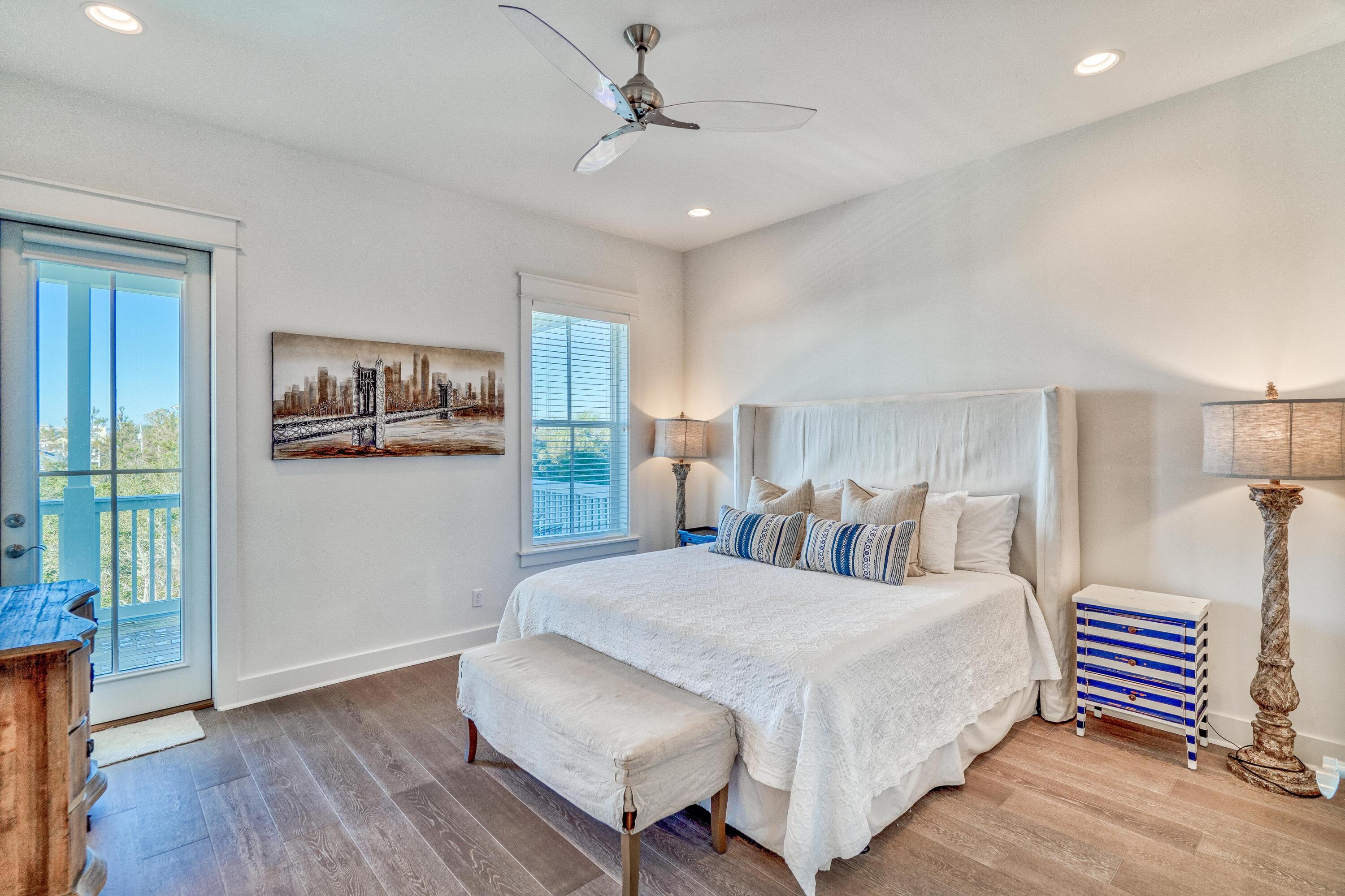 101 A St Inlet Beach Inlet Beach, FL 32461 - Photo 20 of 47 a bedroom with a bed and a chandelier