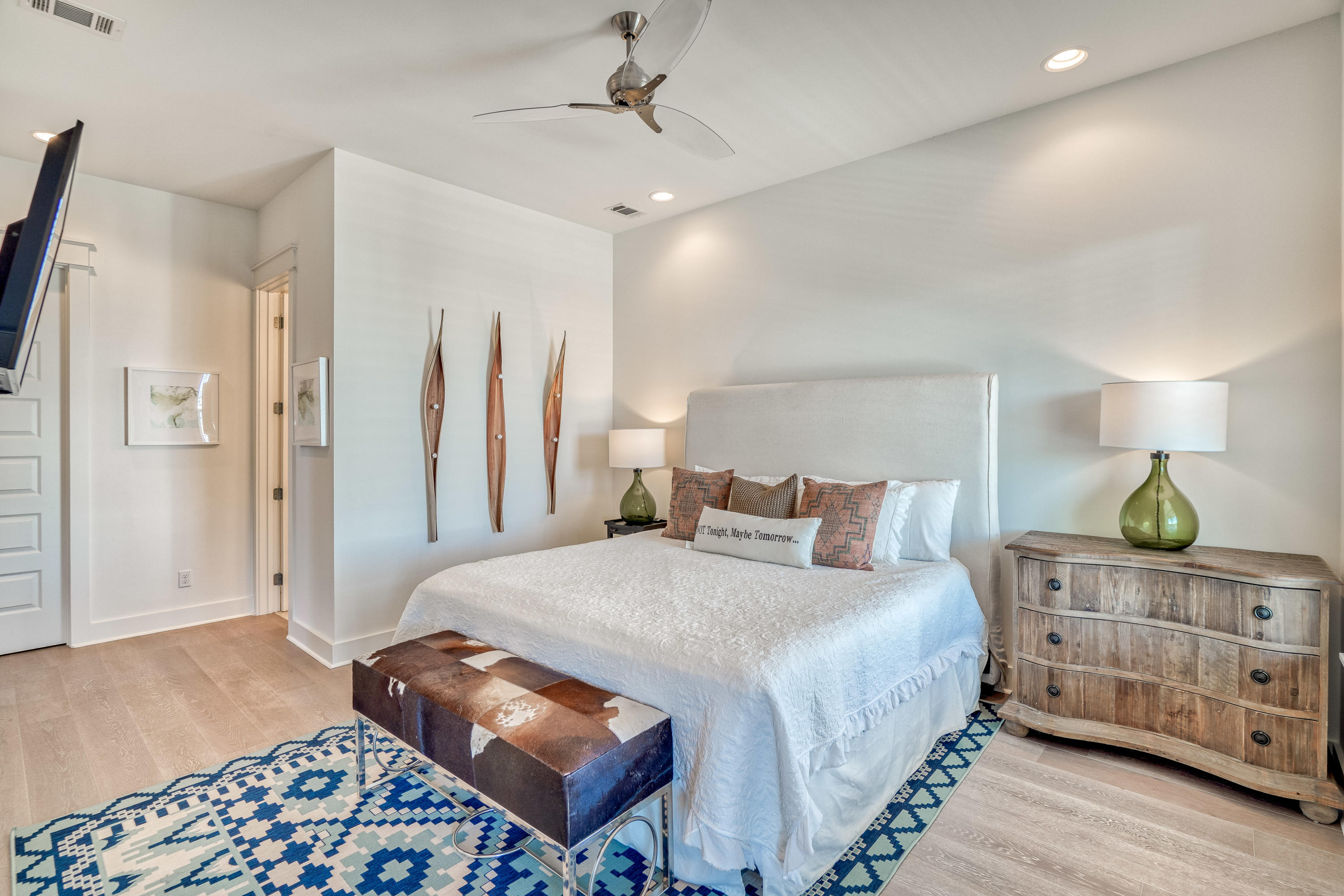 101 A St Inlet Beach Inlet Beach, FL 32461 - Photo 23 of 47 a bedroom with a bed and cabinets