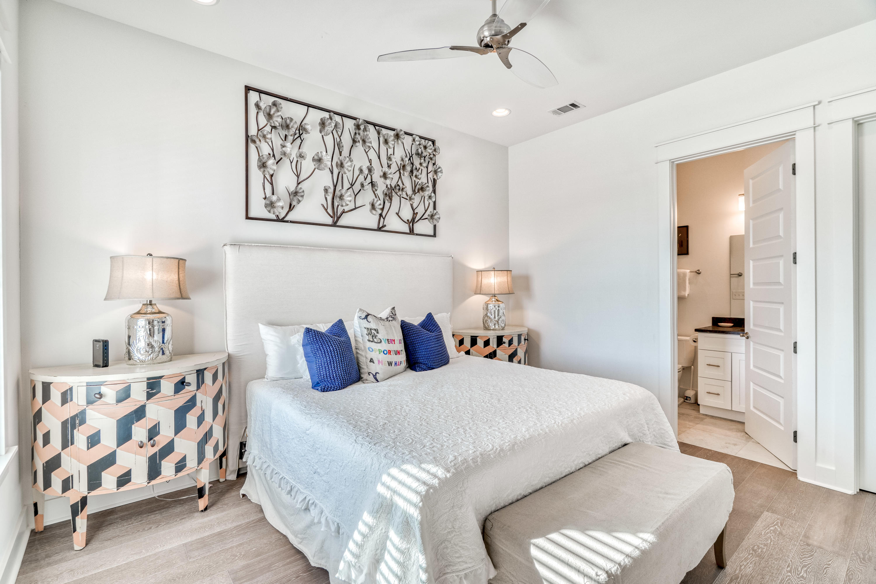 101 A St Inlet Beach Inlet Beach, FL 32461 - Photo 31 of 47 a bedroom with a bed and a chandelier