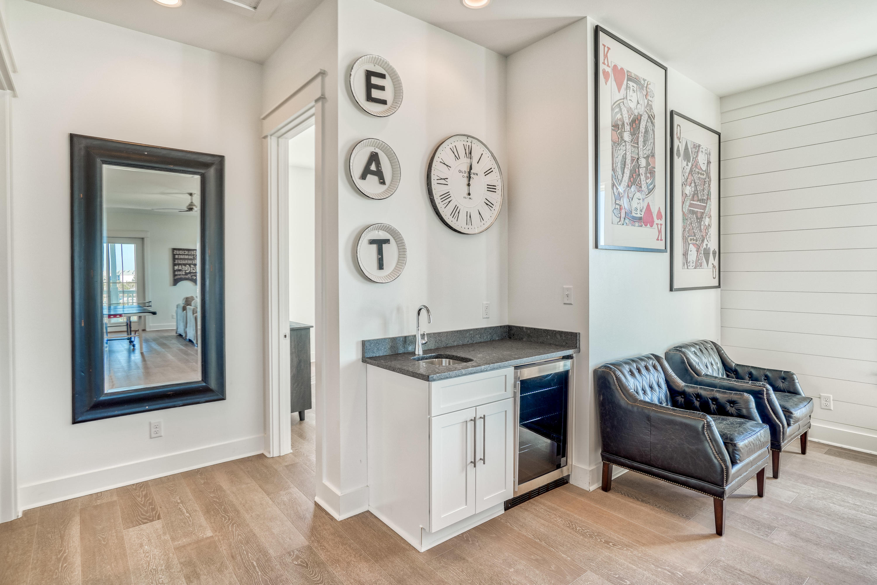 101 A St Inlet Beach Inlet Beach, FL 32461 - Photo 39 of 47 a living room with furniture and a clock